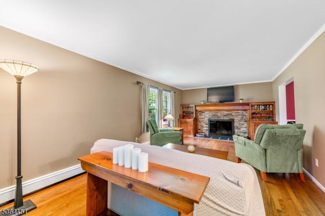 37 Dogwood Dr, Chester Twp, NJ 07930 - living room with light wood-style flooring, baseboard heating, ornamental molding, and a brick fireplace