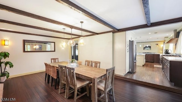 165 Rock Rd W, Green Brook Twp, NJ 08812 - dining area with beamed ceiling and dark wood-type flooring