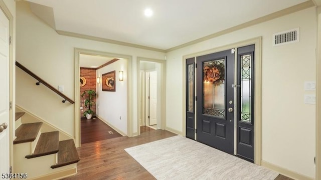 165 Rock Rd W, Green Brook Twp, NJ 08812 - entrance foyer featuring wood finished floors, stairway, and ornamental molding