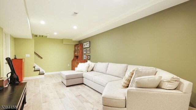 165 Rock Rd W, Green Brook Twp, NJ 08812 - living room with recessed lighting, light wood-type flooring, and stairs