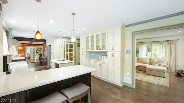 165 Rock Rd W, Green Brook Twp, NJ 08812 - kitchen with dark wood-style flooring, glass insert cabinets, white cabinets, light countertops, and recessed lighting