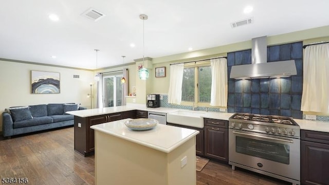 165 Rock Rd W, Green Brook Twp, NJ 08812 - kitchen with stainless steel appliances, wall chimney range hood, light countertops, plenty of natural light, and recessed lighting