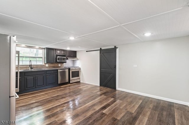 132 Axford Ave, Oxford Twp, NJ 07863 - kitchen with stainless steel appliances, a barn door, a sink, recessed lighting, and dark wood-type flooring