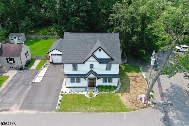 29 Tennis Rd, Jefferson Twp, NJ 07849 - view of front of house featuring a shingled roof, a front yard, and driveway