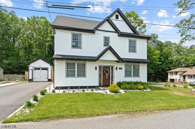 29 Tennis Rd, Jefferson Twp, NJ 07849 - modern farmhouse with an outbuilding, a garage, asphalt driveway, and a shingled roof