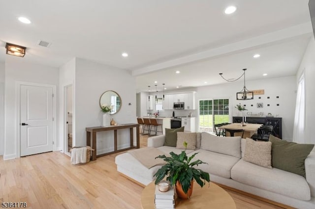 29 Tennis Rd, Jefferson Twp, NJ 07849 - living area featuring recessed lighting, light wood-style floors, and beam ceiling