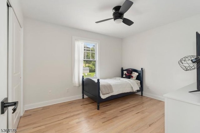 29 Tennis Rd, Jefferson Twp, NJ 07849 - bedroom with light wood-style flooring, ceiling fan, and a closet