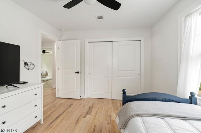 29 Tennis Rd, Jefferson Twp, NJ 07849 - bedroom with light wood finished floors, a closet, and ceiling fan