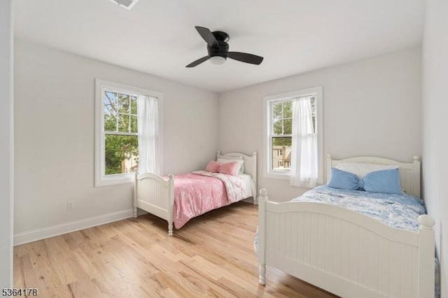29 Tennis Rd, Jefferson Twp, NJ 07849 - bedroom featuring light wood-style floors and ceiling fan