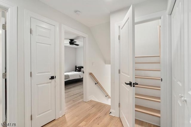 29 Tennis Rd, Jefferson Twp, NJ 07849 - hallway featuring light wood-style flooring and an upstairs landing