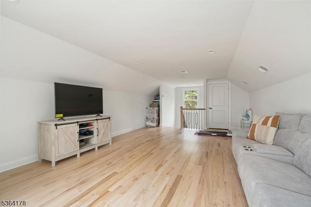 29 Tennis Rd, Jefferson Twp, NJ 07849 - living area featuring light wood-style floors and lofted ceiling