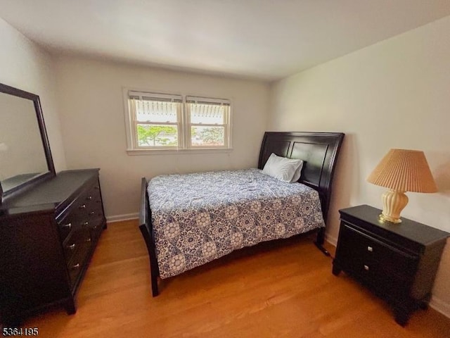 23 Bogle Ave, North Arlington Boro, NJ 07031 - bedroom with wood finished floors and baseboards