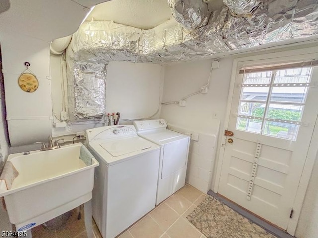 23 Bogle Ave, North Arlington Boro, NJ 07031 - laundry room with washing machine and clothes dryer and light tile patterned floors