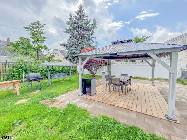 23 Bogle Ave, North Arlington Boro, NJ 07031 - wooden terrace with a gazebo, outdoor dining space, and grilling area
