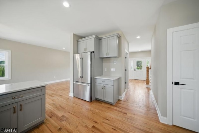 181 Randolph Ave, Mine Hill Twp, NJ 07803 - kitchen with gray cabinetry, freestanding refrigerator, light wood-style flooring, recessed lighting, and light countertops