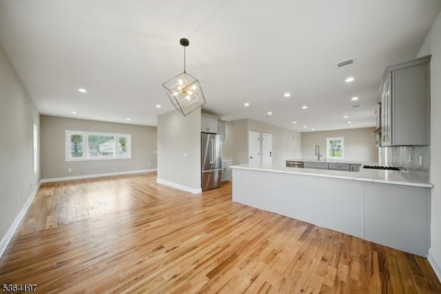181 Randolph Ave, Mine Hill Twp, NJ 07803 - unfurnished living room featuring light wood-style floors, recessed lighting, and a chandelier