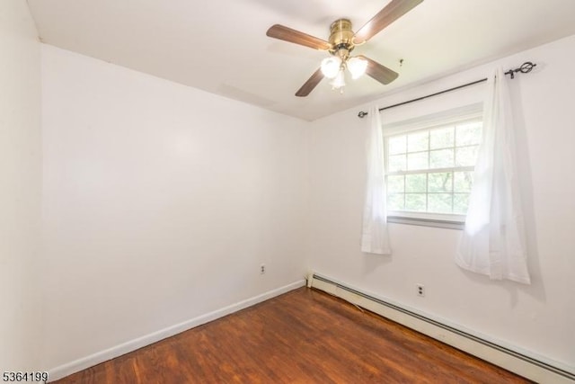 11 Putters Rd, Roxbury Twp, NJ 07876 - unfurnished room featuring a baseboard heating unit, wood finished floors, and a ceiling fan