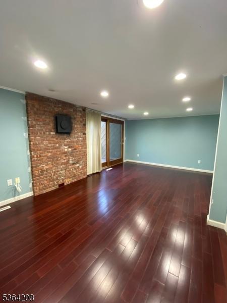 9 Village Way Unit B5, Vernon Twp, NJ 07462 - spare room with dark wood finished floors and recessed lighting