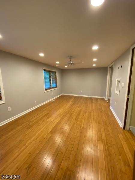 9 Village Way Unit B5, Vernon Twp, NJ 07462 - unfurnished room with wood finished floors, a ceiling fan, and recessed lighting