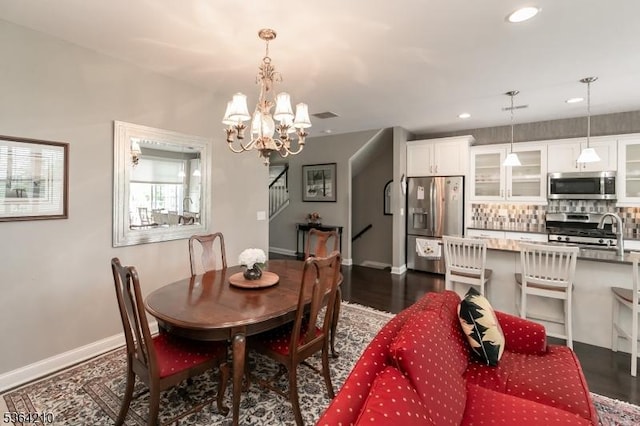 3 Indigo Rd, Allamuchy Twp, NJ 07840 - dining area with stairway, a chandelier, and recessed lighting