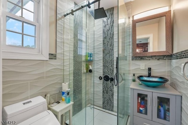 129 S Munn Ave, East Orange City, NJ 07018 - full bathroom featuring tile walls, vanity, and a stall shower