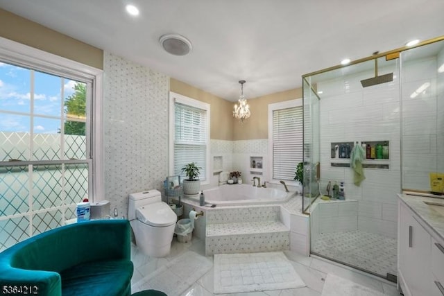129 S Munn Ave, East Orange City, NJ 07018 - full bath with a chandelier, a bath, a shower stall, and plenty of natural light