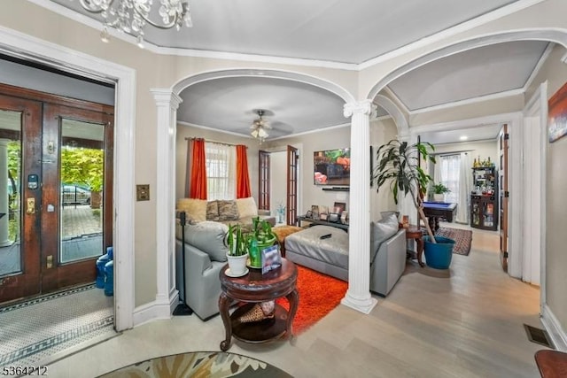 129 S Munn Ave, East Orange City, NJ 07018 - living room with french doors, arched walkways, ornate columns, wood finished floors, and crown molding