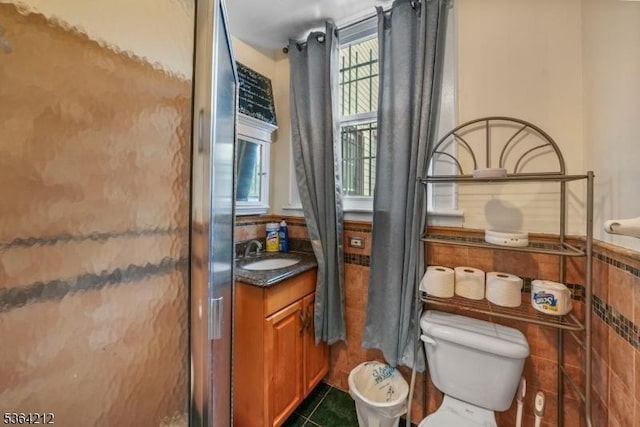 129 S Munn Ave, East Orange City, NJ 07018 - bathroom featuring vanity, tile patterned floors, and a wainscoted wall