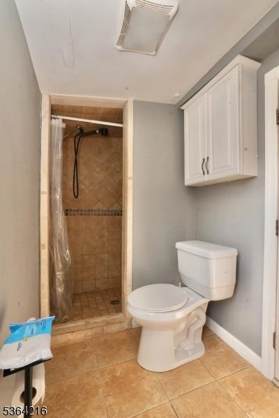 214 Franklin Ave, Seaside Heights Boro, NJ 08751 - full bathroom featuring a shower stall and tile patterned floors
