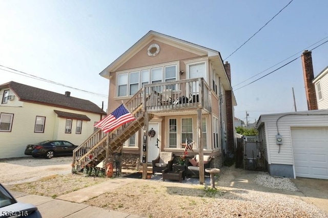 214 Franklin Ave, Seaside Heights Boro, NJ 08751 - multi unit property featuring stairs, a balcony, and stucco siding