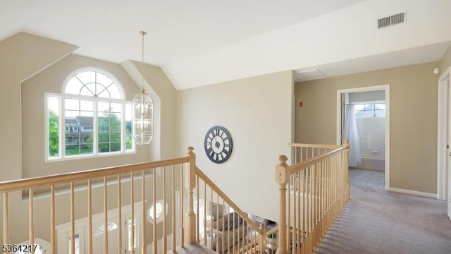 74 Oxford Pl, Hillsborough Twp, NJ 08844 - corridor featuring an upstairs landing, carpet flooring, lofted ceiling, and a chandelier
