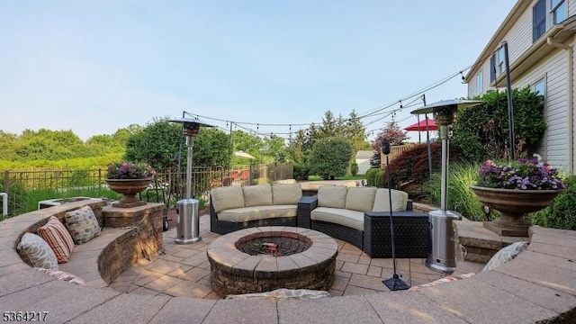 74 Oxford Pl, Hillsborough Twp, NJ 08844 - fenced backyard featuring a patio and an outdoor living space with a fire pit