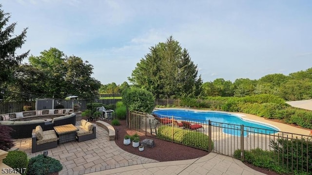 74 Oxford Pl, Hillsborough Twp, NJ 08844 - view of swimming pool with a patio area, a fenced backyard, and outdoor lounge area