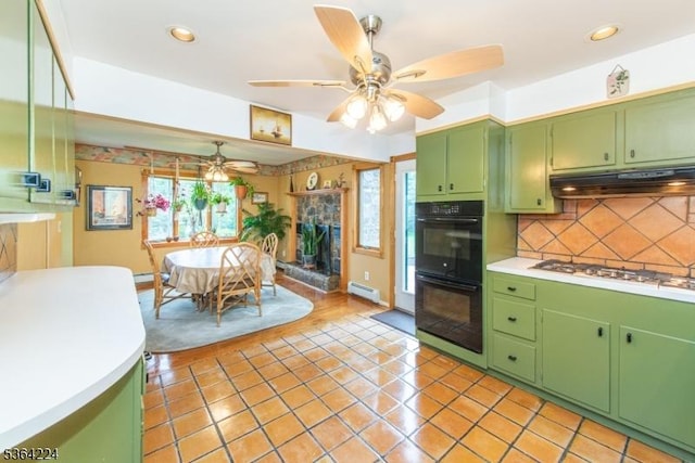 25 Mordaunt Rd, Vernon Twp, NJ 07462 - kitchen featuring green cabinetry, gas stovetop, under cabinet range hood, ceiling fan, and plenty of natural light