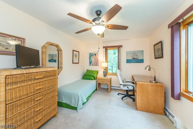 25 Mordaunt Rd, Vernon Twp, NJ 07462 - bedroom featuring carpet, a baseboard heating unit, and a ceiling fan