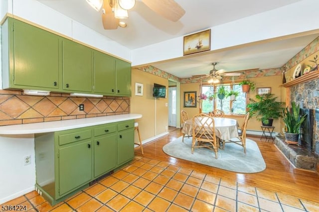 25 Mordaunt Rd, Vernon Twp, NJ 07462 - kitchen featuring ceiling fan, green cabinets, and light countertops