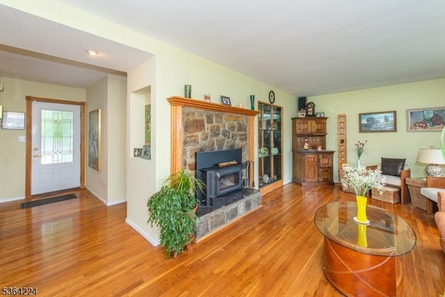 25 Mordaunt Rd, Vernon Twp, NJ 07462 - living area featuring light wood finished floors and a wood stove