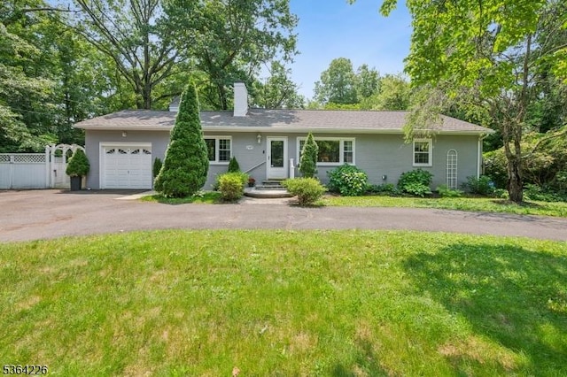 1707 Valley Rd, Long Hill Twp, NJ 07946 - ranch-style home featuring an attached garage, a chimney, and driveway