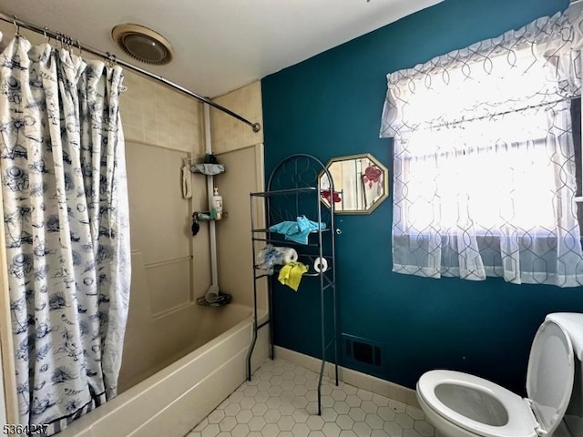 33 Fisher Ave, Bound Brook Boro, NJ 08805 - full bath featuring shower / bath combo and tile patterned floors