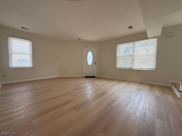 33 Fisher Ave, Bound Brook Boro, NJ 08805 - foyer with healthy amount of natural light and light wood-style flooring