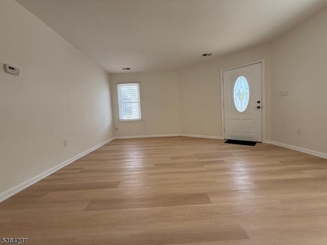 33 Fisher Ave, Bound Brook Boro, NJ 08805 - foyer with baseboards and light wood finished floors