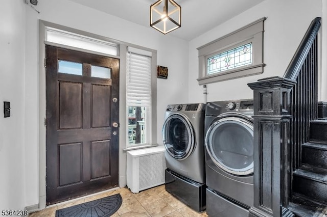 1332 Maple Ter, Rahway City, NJ 07065 - laundry area with washer and dryer and light tile patterned flooring