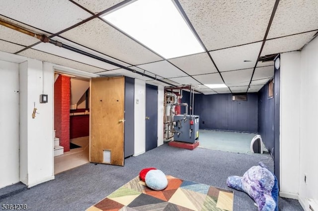 1332 Maple Ter, Rahway City, NJ 07065 - finished basement featuring a paneled ceiling, carpet floors, and a heating unit