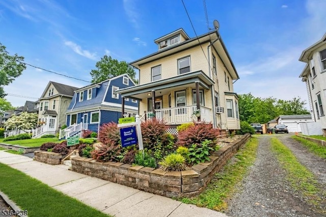 1332 Maple Ter, Rahway City, NJ 07065 - american foursquare style home featuring covered porch and a residential view