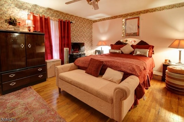 6 Essex St Unit F-32, Belleville Twp, NJ 07109 - bedroom with wood finished floors, wallpapered walls, and ceiling fan