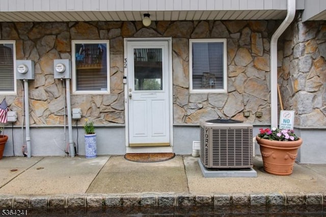 6 Essex St Unit F-32, Belleville Twp, NJ 07109 - view of exterior entry featuring stone siding