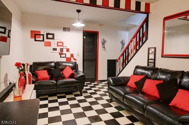 6 Essex St Unit F-32, Belleville Twp, NJ 07109 - living room featuring tile patterned floors and stairs