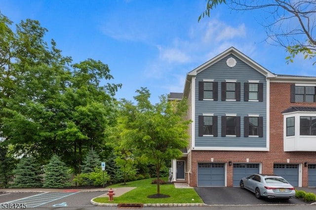 4 Hanover Rd Unit 1, Florham Park Boro, NJ 07932 - view of property with brick siding, a garage, driveway, and a front lawn