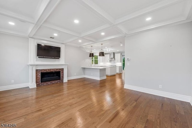4 Hanover Rd Unit 1, Florham Park Boro, NJ 07932 - unfurnished living room featuring light wood-style floors, coffered ceiling, a fireplace, beam ceiling, and recessed lighting