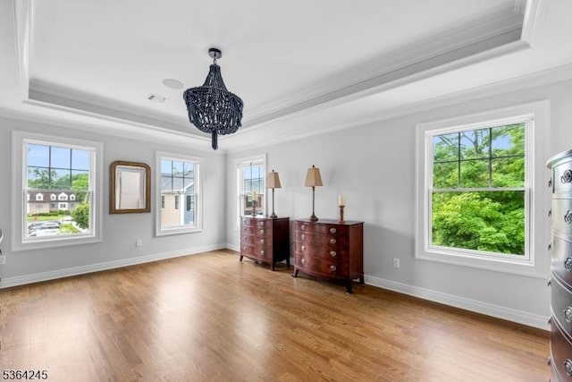 4 Hanover Rd Unit 1, Florham Park Boro, NJ 07932 - bedroom with a raised ceiling, ornamental molding, wood finished floors, and a chandelier